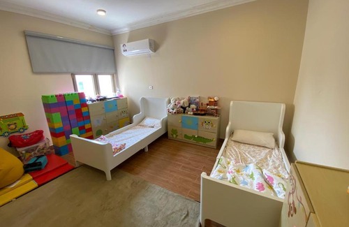 Doha Villa | Discover Algharafa Villa: Child-Friendly 4-Star Retreat