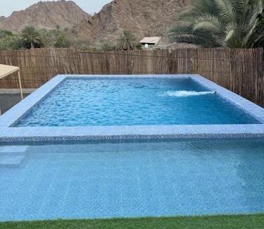 Hatta House | Discover Alhara Lodge: Family-Friendly with Pool & High Ratings