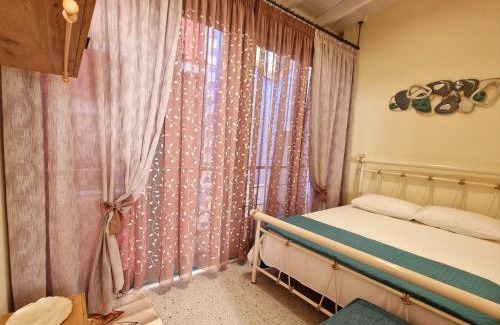 Arcoudi Apartment | Top-Rated Alkionisnest: Family-Friendly Retreat Awaits
