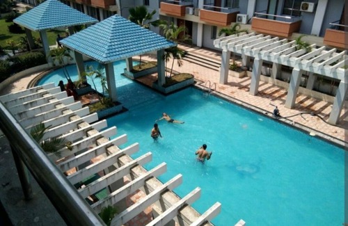 Puri Apartment | Relaxing Retreat with Modern Amenities and Ocean Breeze