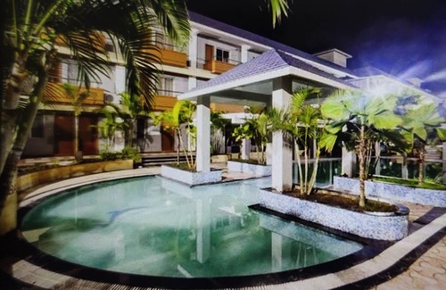 Puri Apartment | Relaxing Retreat with Modern Amenities and Ocean Breeze