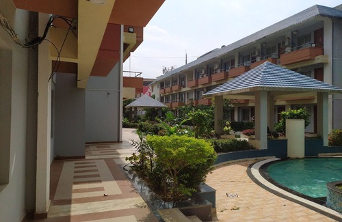 Puri Apartment | Relaxing Retreat with Modern Amenities and Ocean Breeze