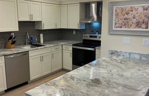 Hammock Bay Condo | ALL NEW/NO STEP LIVING W/PANORAMIC HAMMOCK BAY GOLF COURSE VIEW at MARCO SHORES