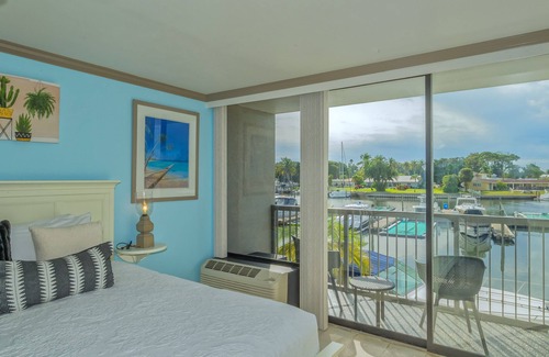 Trailer Estates Hotel | Modern Waterfront Retreat with Balcony, Pool & Tiki Bar