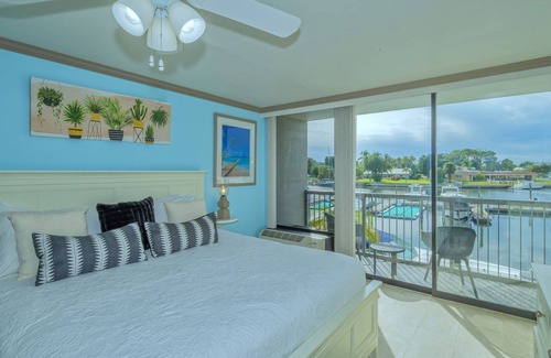 Trailer Estates Hotel | Modern Waterfront Retreat with Balcony, Pool & Tiki Bar