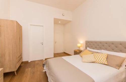 Historic Centre Apartment | Explore All'Ombra del Grattacielo - Family & Pet Friendly Stay