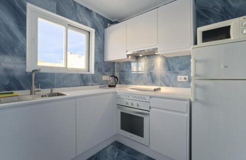 Sant Antoni de Portmany Apartment | Relax at All Suite Ibiza Aparthotel with Oceanfront Views