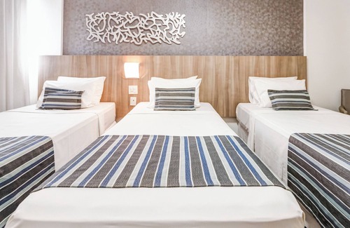 Indaia Hotel | Discover Allia Gran Pampulha Suites with Pool & Restaurant