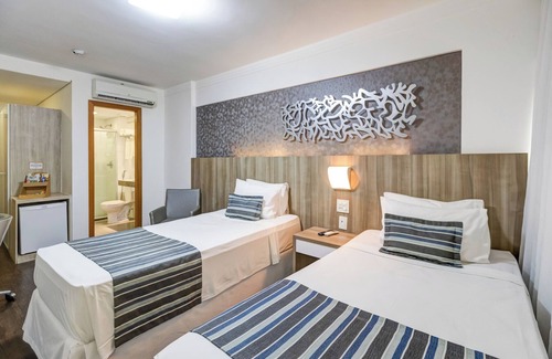 Indaia Hotel | Discover Allia Gran Pampulha Suites with Pool & Restaurant