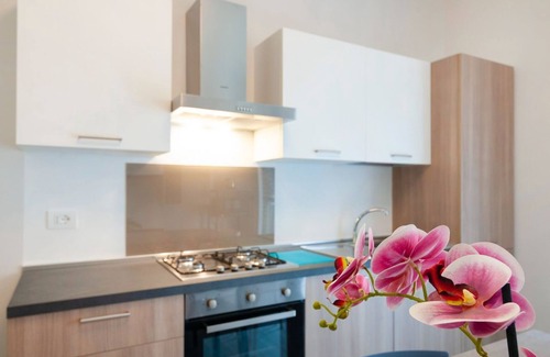 Cittadella Apartment | Spacious Apartment Steps from Train Station with Balcony