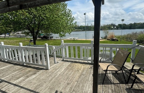 Smyrna Cottage | AllSports lakefront cottage. 3 bedrooms, 2 baths, private beach, yard and deck
