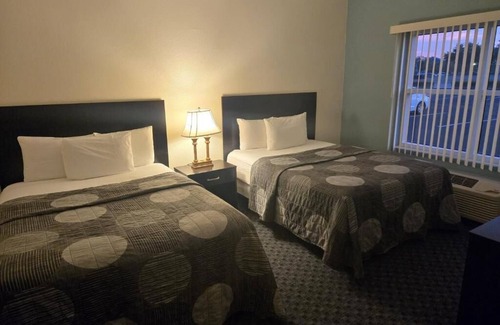 Cypress Lake Hotel | Allure Suites: Relax with Pool, Spa & Family-Friendly Amenities