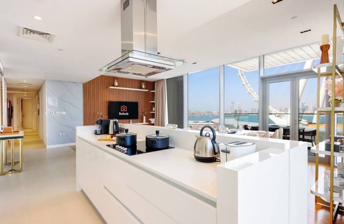 Dubai Apartment | Seaside Escape: 3BR Bluewaters Suite with Pool & Views