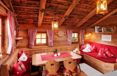 Hundsdorfl Ski Chalet | Unforgettable Almdorf Flachau: 4-Star Cabin Retreat