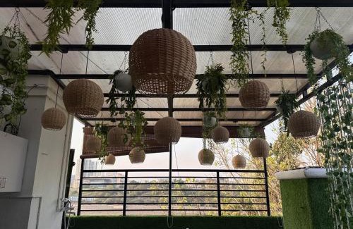 Koregaon Park Apartment | Aloha: Private Room with Terrace Jacuzzi & Lake View
