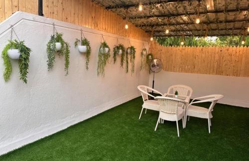 Koregaon Park Apartment | Aloha: Private Room with Terrace Jacuzzi & Lake View