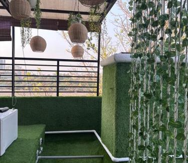 Koregaon Park Apartment | Aloha: Private Room with Terrace Jacuzzi & Lake View