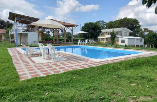 Quimbaya Cabin | Oceanfront Alojamiento Sol de Maíz with Pool & Restaurant