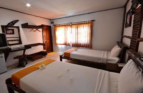 Khanom Hotel | Relax at Alongkot Beach Resort Khanom with Family-friendly Amenities