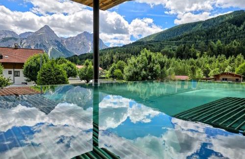 Lermoos Apartment | Discover Alpen Appartements Lärchenhof: Pool & Spa Retreat