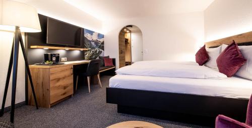 Andermatt Hotel | Family-Friendly Alpenhotel Schlüssel with Top Guest Ratings
