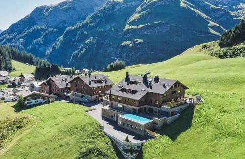 Warth Hotel | Relaxing AlpenParks Hotel & Apartment Arlberg with Pool
