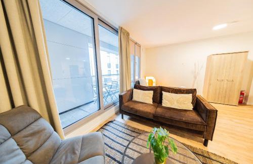Kop van Zuid Apartment | Elegant Stays at The Hendrick - Family-Friendly Retreat