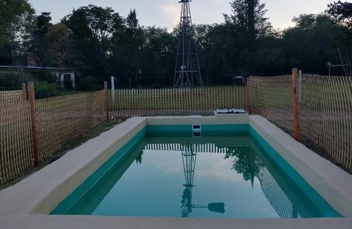 Villa Anisacate Apartment | Discover ALPINAS: Pet-Friendly Retreat with Pool Access