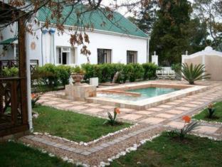 George Hotel | Discover Alpine Inn: Pool, Breakfast & Family-Friendly Fun