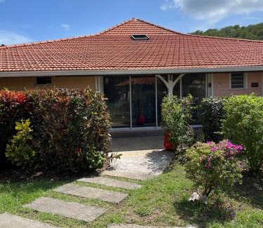 Sainte-Anne Apartment | Alpinia: Oceanfront Retreat with Pool & 9.5/10 Guest Rating