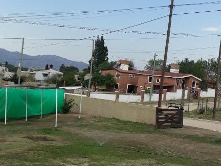 Comuna Estancia Vieja House | Comfortable Temporary Rentals with Inviting Pool Access