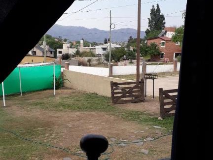 Comuna Estancia Vieja House | Comfortable Temporary Rentals with Inviting Pool Access