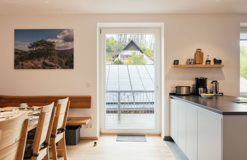 Fischbach bei Dahn Apartment | Relaxing Lake View Retreat at Altes Zollhaus by Interhome