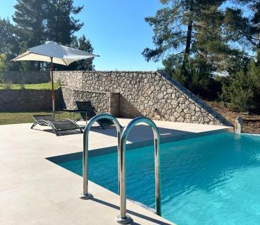 Amfikleia-Elateia Ski Chalet | Discover Alti Parnassos: 4-Star Retreat with Pool Access
