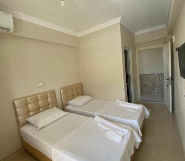 Marmara Hotel | Discover Altinkum Tatil Konakları with Private Beach Access