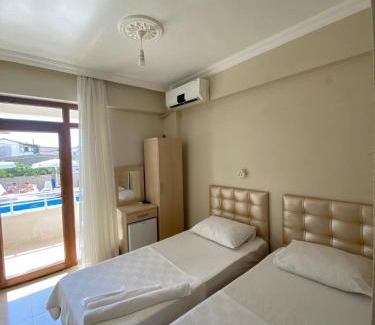 Marmara Hotel | Discover Altinkum Tatil Konakları with Private Beach Access
