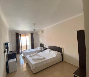 Marmara Hotel | Discover Altinkum Tatil Konakları with Private Beach Access