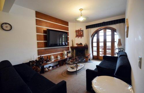 Alto do Capivari Apartment | Relax at Alto do Capivari with Pool and Ocean Views