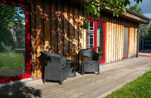 Liepaja Apartment | Altribute Studio: Eco-Friendly with Sauna & Secure Parking