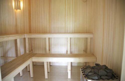 Liepaja Apartment | Altribute Studio: Eco-Friendly with Sauna & Secure Parking