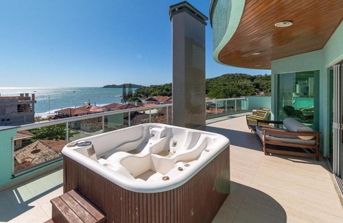 Bombas Apartment | Experience Ocean Views and Jacuzzi Bliss at Bombas SC