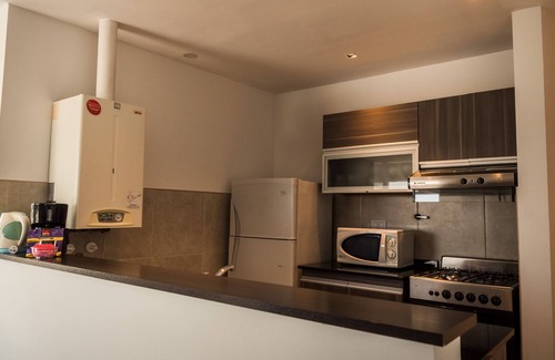 Villa Carlos Paz Hotel | Experience Amérian Carlos Paz Apart & Suites with Pool Access