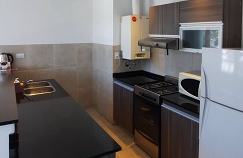 Villa Carlos Paz Hotel | Experience Amérian Carlos Paz Apart & Suites with Pool Access