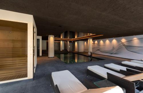 Sciaves Apartment | Experience Am Brunnen Apartments: 4-Star Oceanfront Retreat