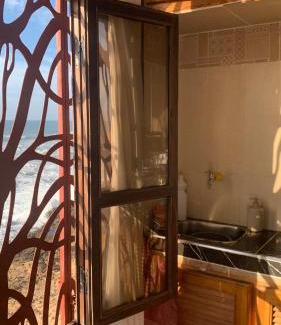 Tamri Apartment | Oceanfront Amaan Cottage: Top-Rated Stay with Private Beach