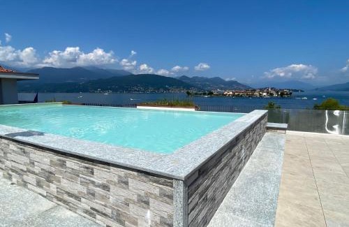 Carciano Apartment | Amadeus: Oceanview Retreat with Pool & Family-Friendly Perks