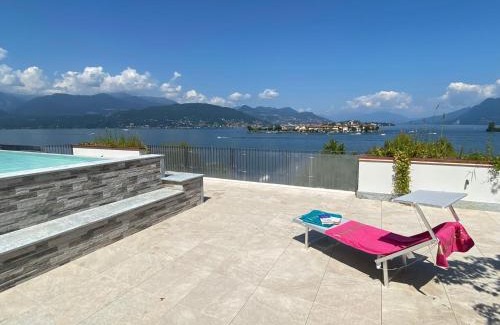 Carciano Apartment | Amadeus: Oceanview Retreat with Pool & Family-Friendly Perks