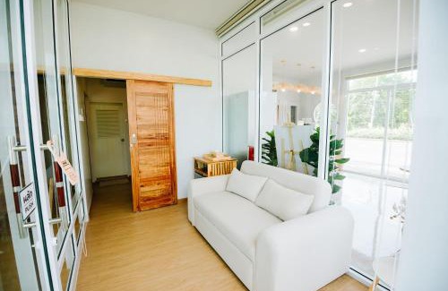 Pak Nam Resort | Beachfront Relaxation at Amanda: Spa, Dining & Family Fun