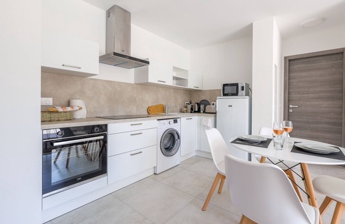 Marine de Saint Ambroggio Apartment | Ocean View Amandula Apartment with Spa & Family-Friendly Amenities