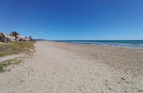 Cabanes Apartment | Beachside Bliss at Torre la Sal: Pool, WiFi & Garage